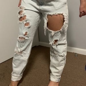 Light wash, ripped boyfriend jeans
